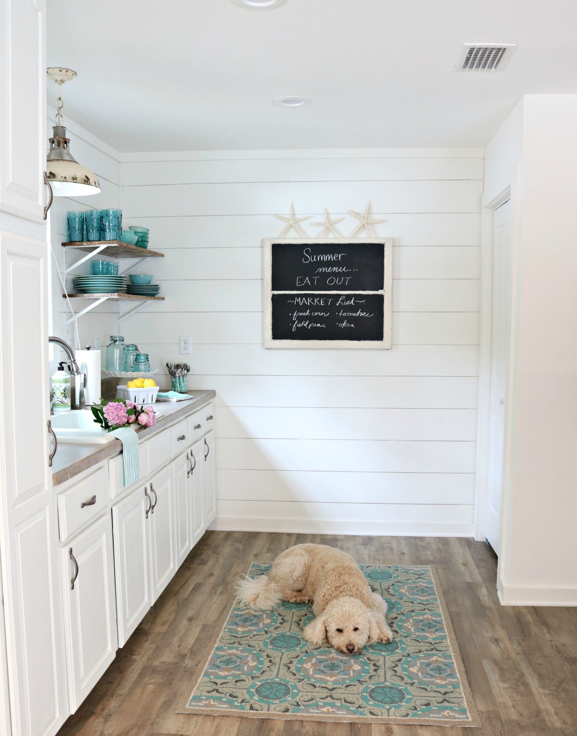 Tiny kitchen in the farmhouse cottage add interest with a shiplap wall or two at Refresh Restyle