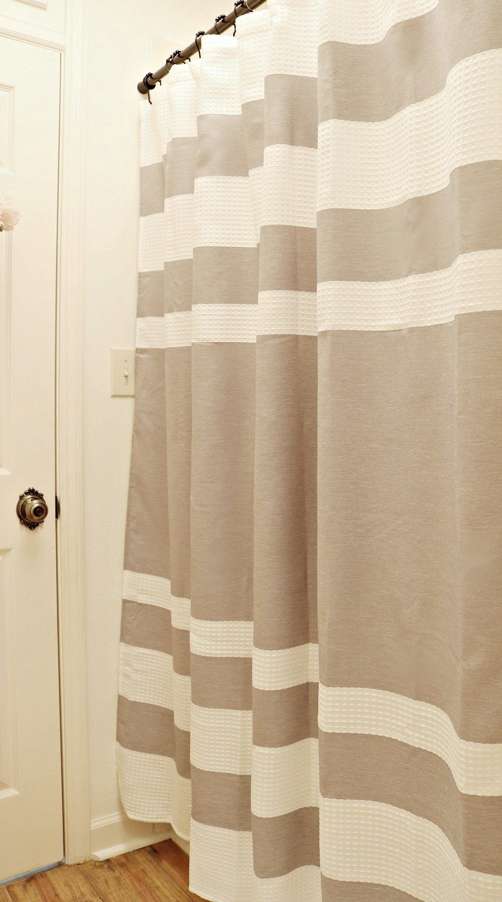 Waffle stripe shower curtain perfect for a neutral bathroom