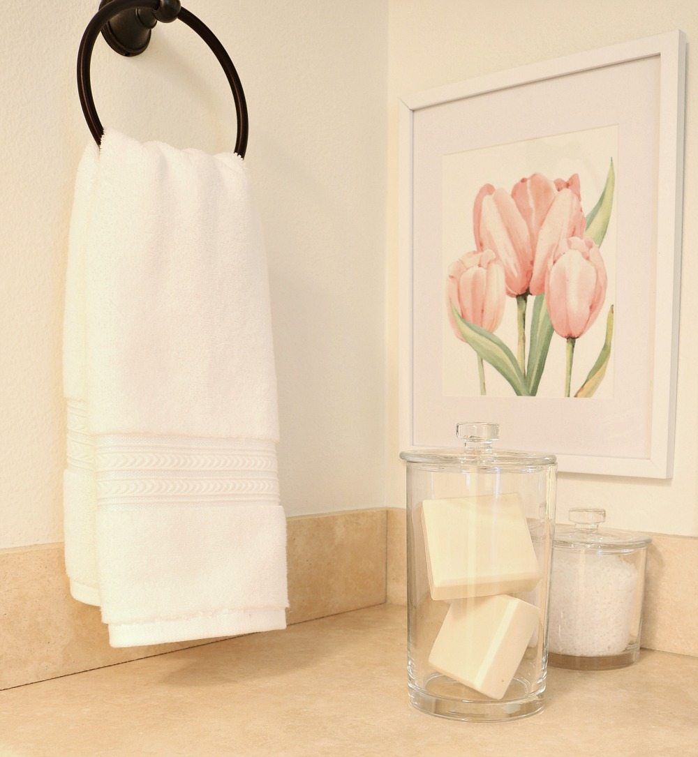 Love using white towels and simple clean storage for a clutter free bathroom