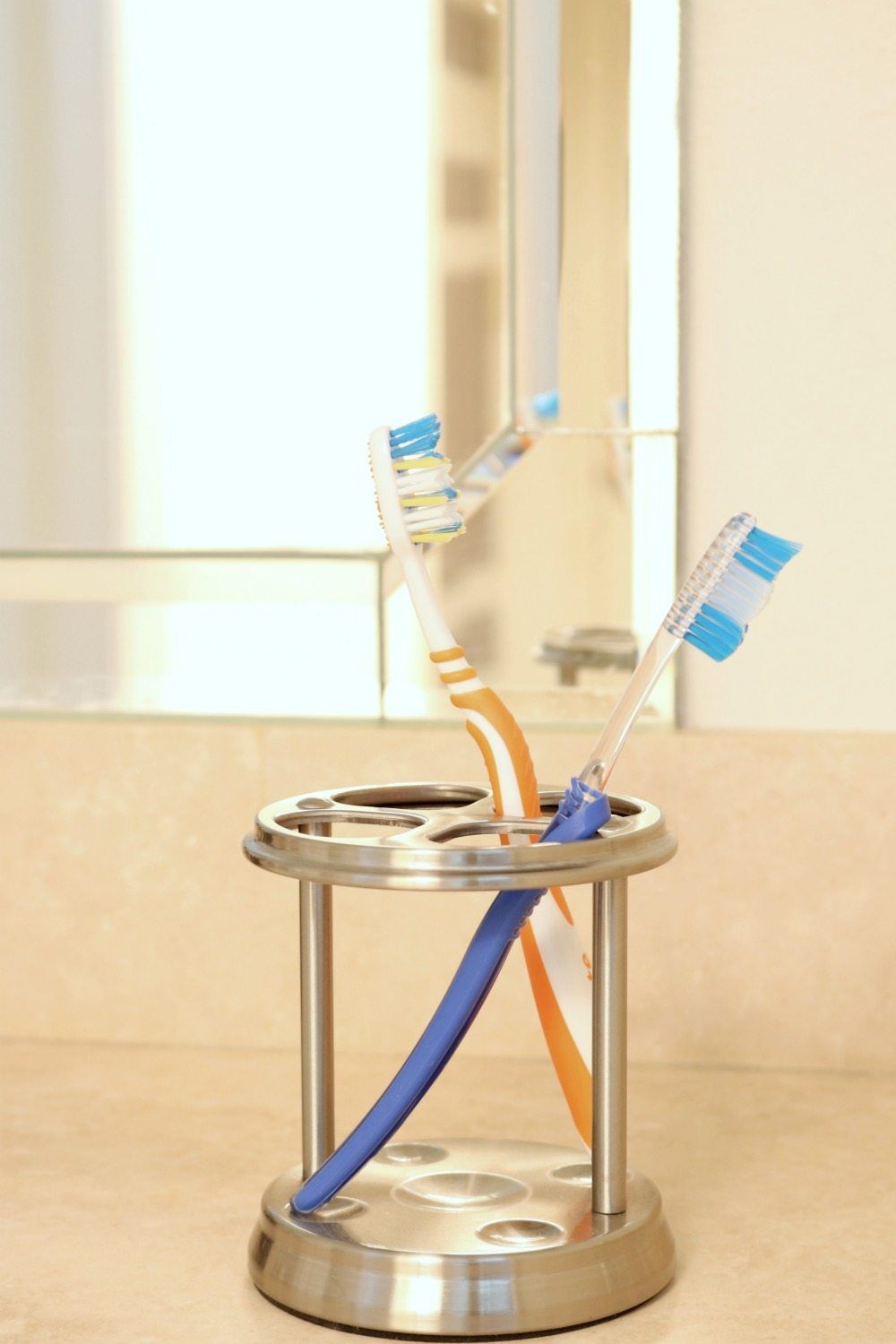 Have a place for the guest to put their toothbrush but keep it simple and easy to clean