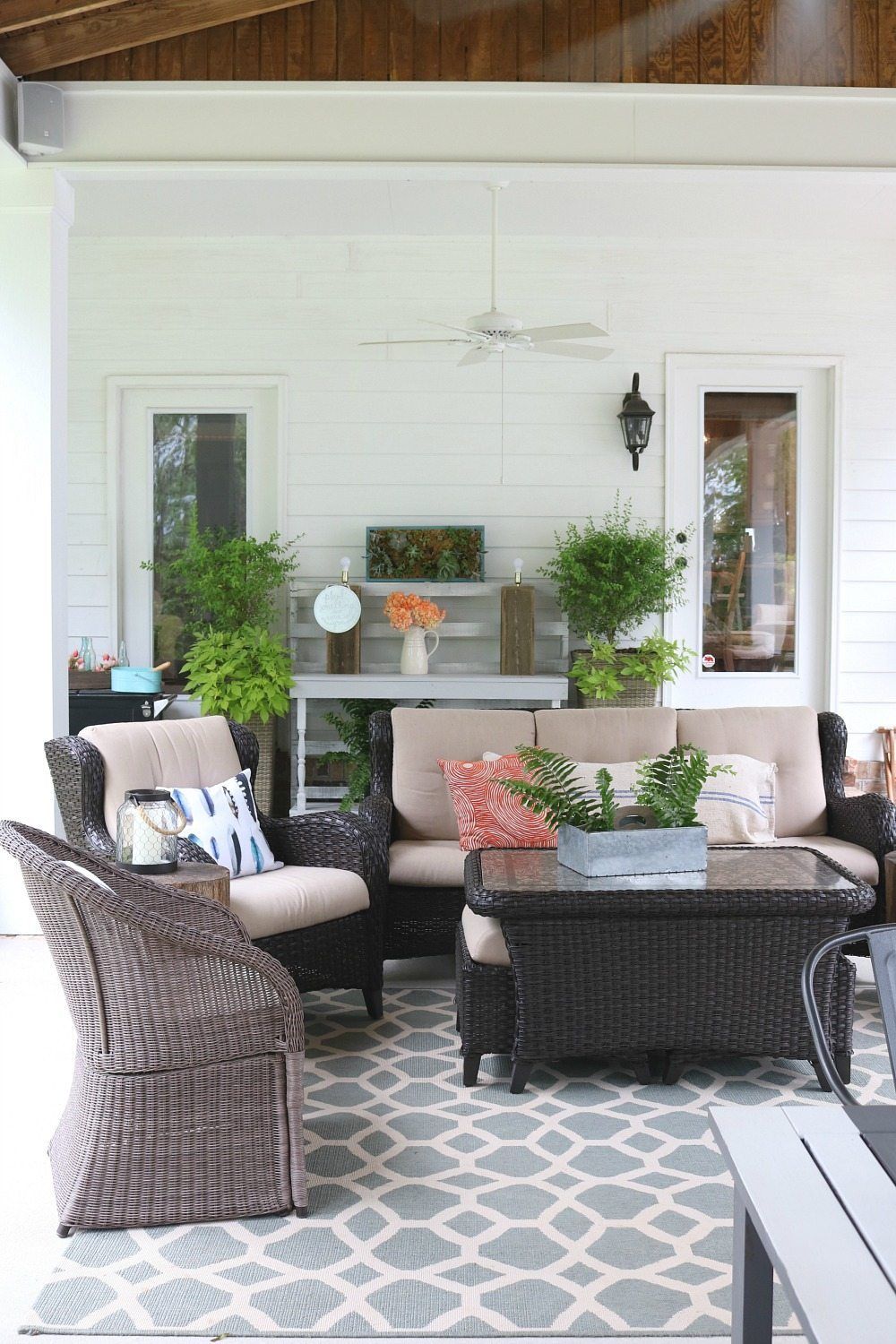 Living area on the summer ready porch at Refresh Restyle