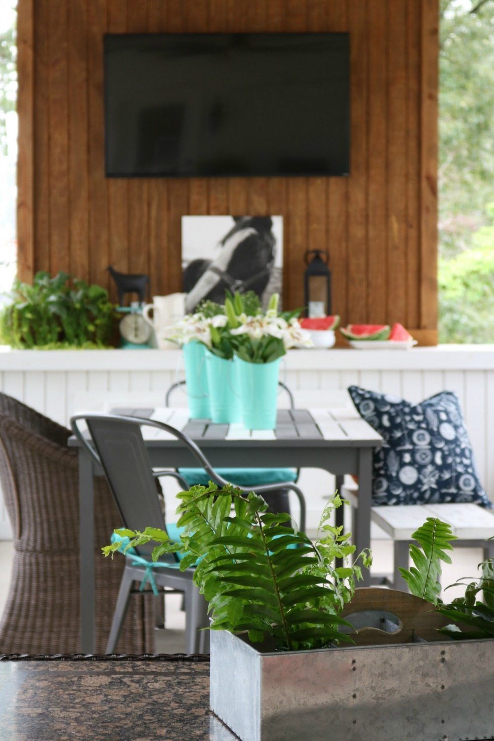 Ferns in galvanized metal on the farmhouse porch at Refresh Restyle
